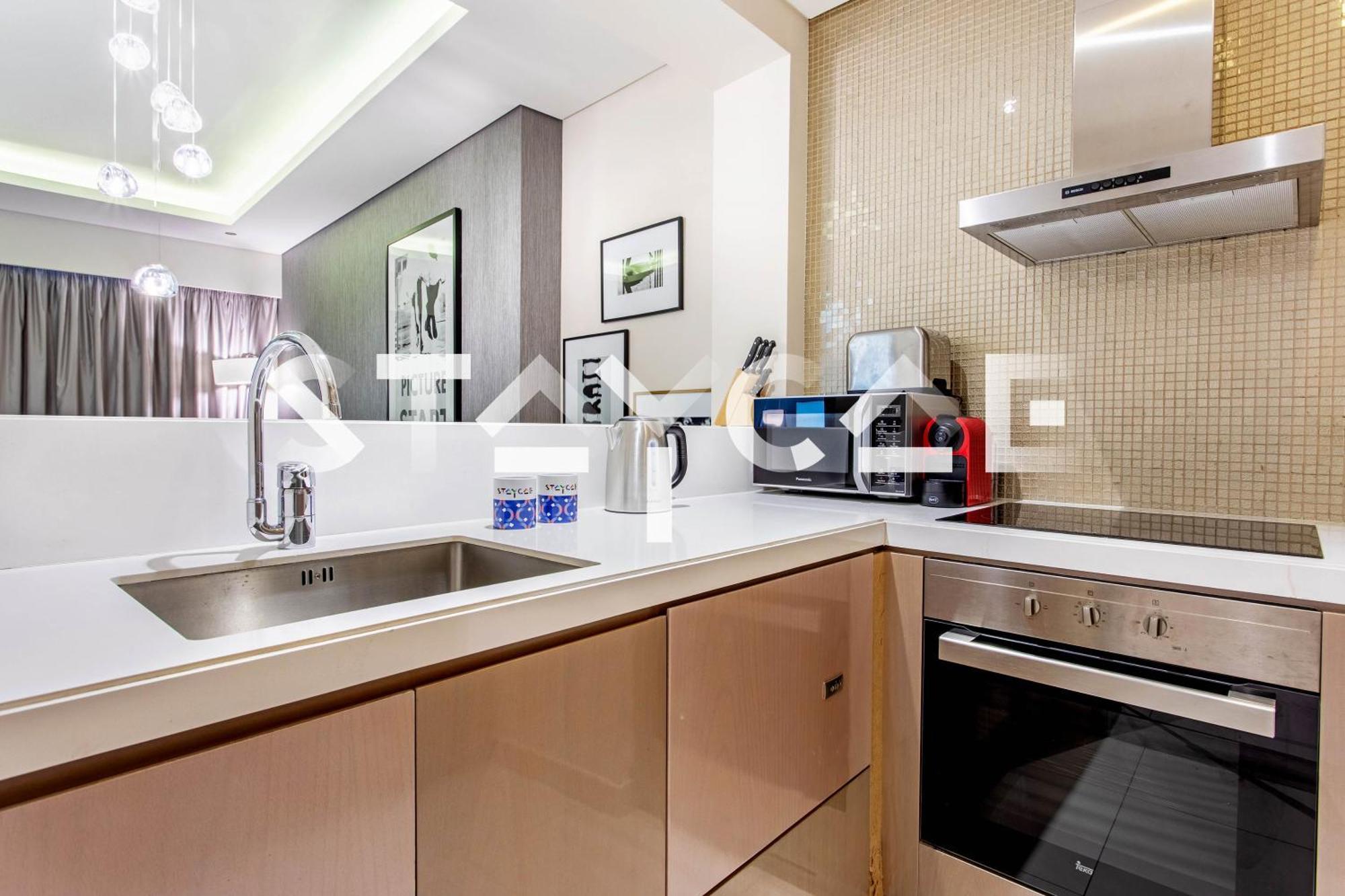 Staycae Homes - Damac Towers By Paramount Apartment